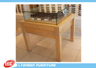Drewniany detaliczny stół ekspozycyjny MDF do prezentacji okularów przeciwsłonecznych, naklejka z logo